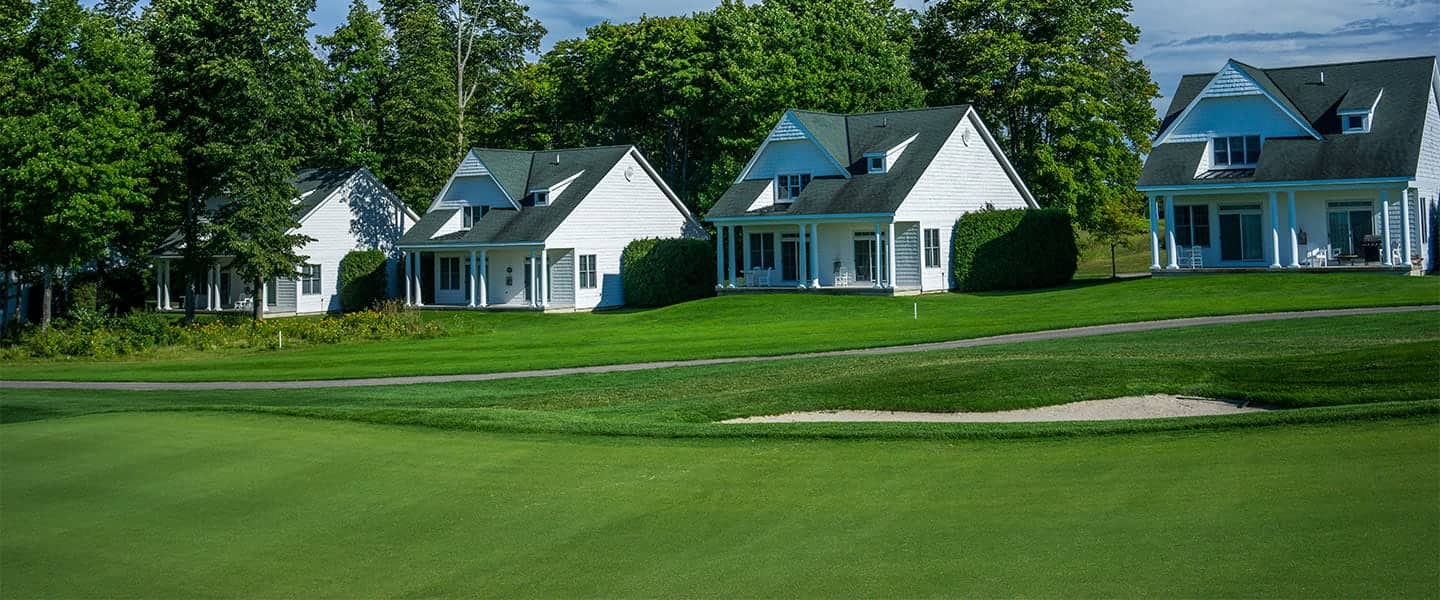 Crooked Tree Cottages line the golf course