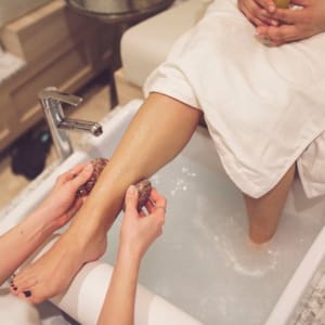 Woman getting pedicure